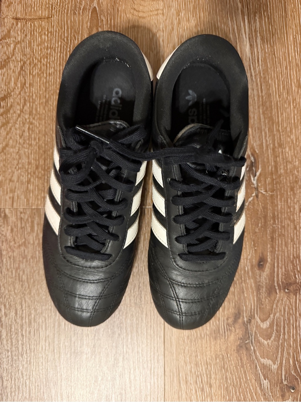 Adidas Black Sneakers with White Three-Stripes